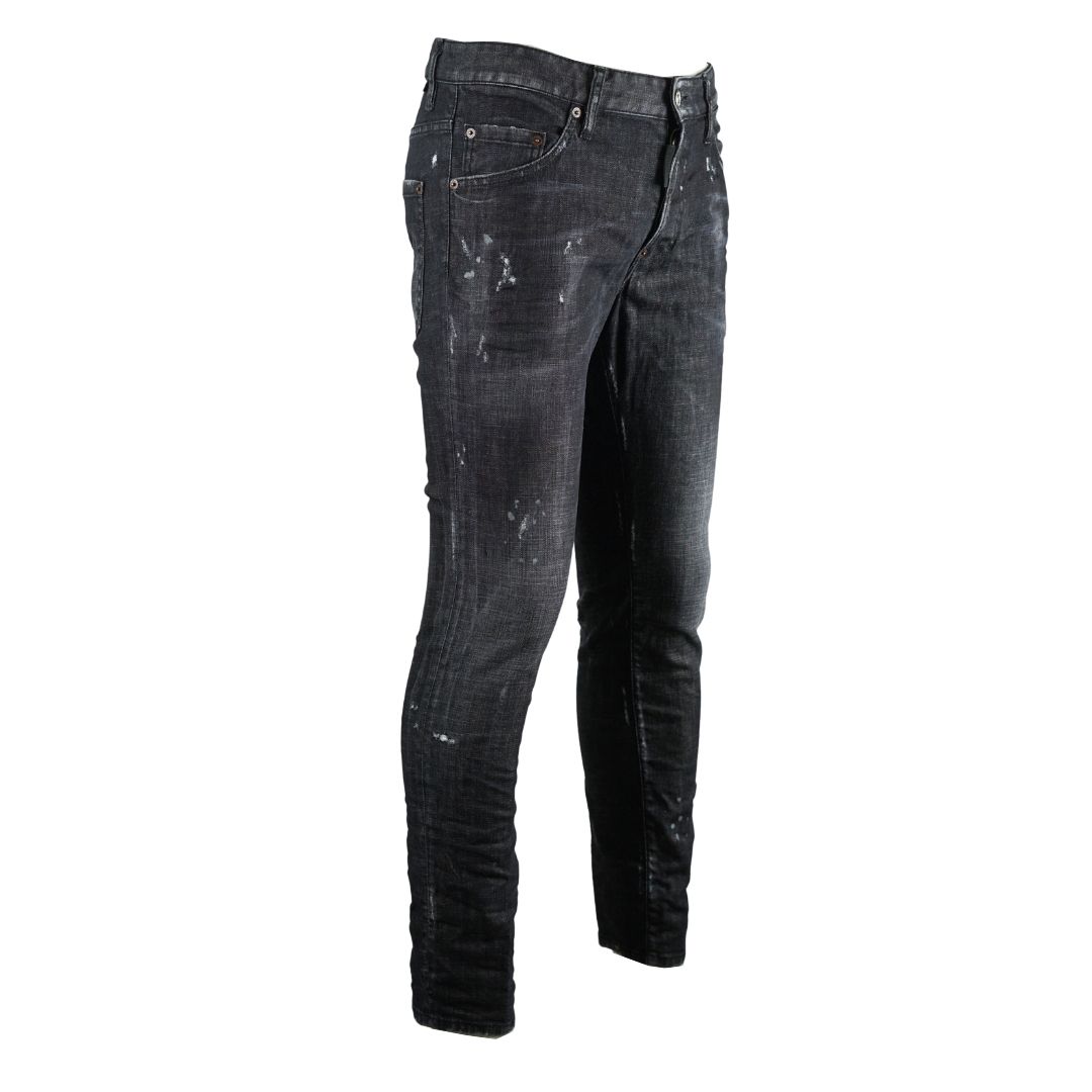 Dsquared2 Skater Jean Worn Faded Black Jeans. Dsquared2 Skater Jean S71LB0658 S30357 900. Stretch Denim 98% Cotton 2% Elastane. Button Fly, Worn and Faded Denim. Slim Fit With A Tapered Leg. Branded Badge