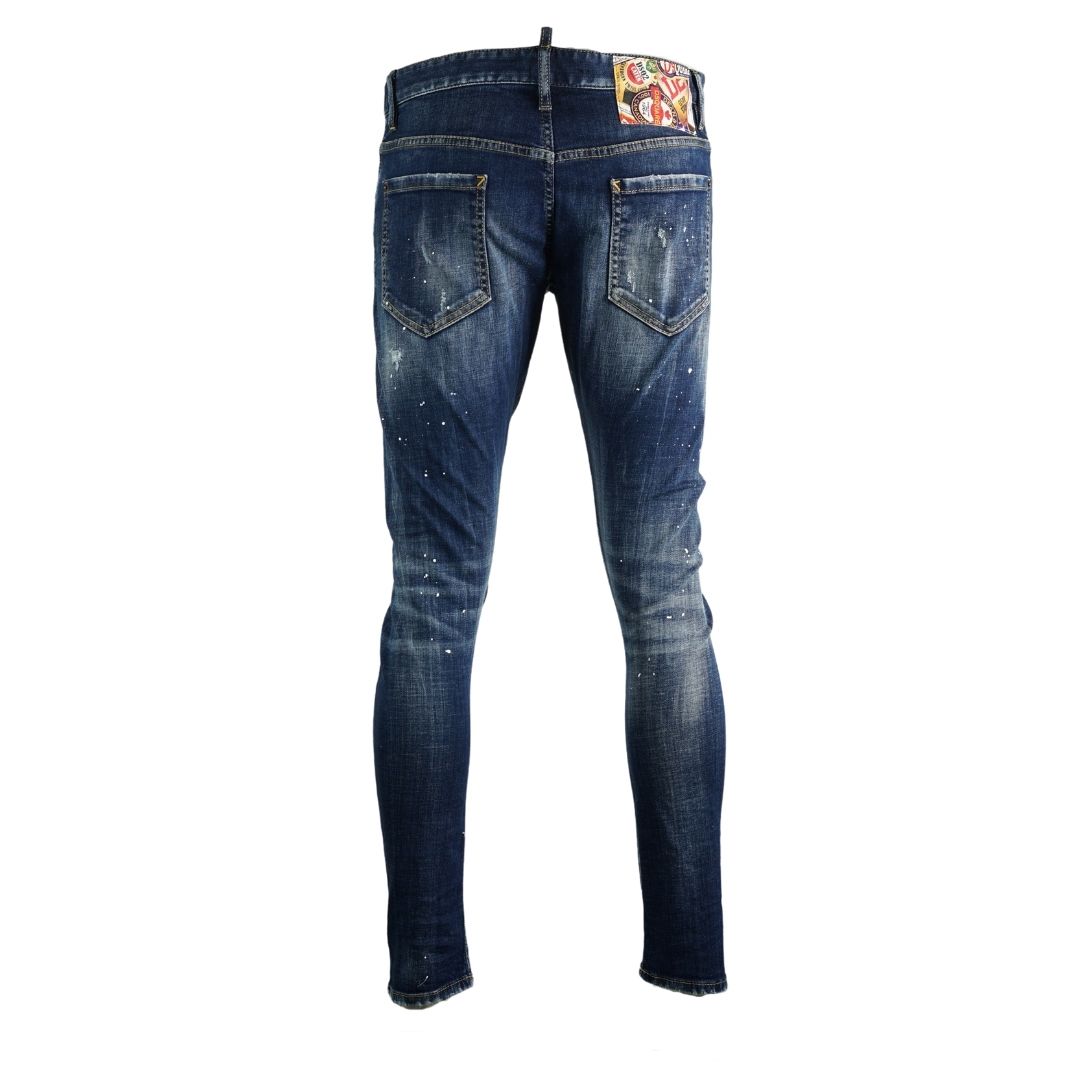 Dsquared2 Sexy Twist Jean Paint Splatter Jeans. Dsquared2 Sexy Twist Jean S74LB0596 S30342 470. Stretch Denim 98% Cotton 2% Elastane. Button Fly. Slim Fit With A Tapered Leg. Large Branded Badge ,Paint Splash Detail, Destroyed Reinforced Denim