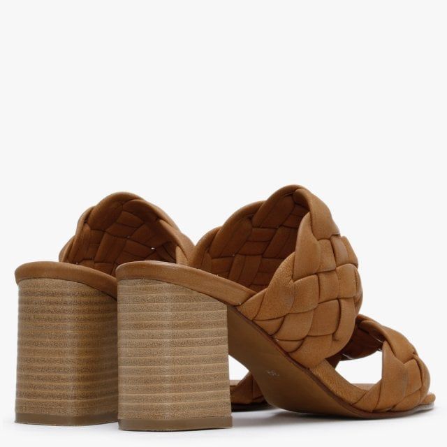 The Daniel Sanza Leather Chunky Woven Block Heel Mules are part of the New Season collection. These must have block heel sandals are the perfect style to take you from day to night with ease. Crafted from a premium leather upper with luxurious leather lining. An easy to wear slip on mule featuring a chunky two strap woven upper. Signature Daniel branding is seen on the foot-bed.