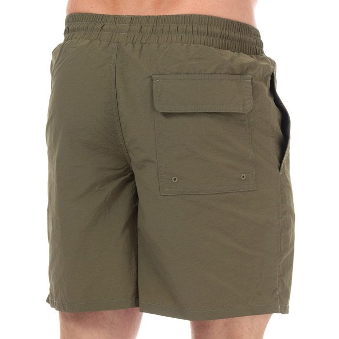 Mens Lyle And Scott Plain Swim Shorts in lichen green.<BR><BR>- Elasticated waist with drawcord. <BR>- Side welt pockets. <BR>- Rear flap pocket with hook and loop closure.<BR>- Side split hems.<BR>- Inner mesh briefs.<BR>- Embroidered eagle logo at left hem.<BR>- Regular fit.<BR>- Inside leg length measures 6.5“ approximately.<BR>- Shell: 100% Nylon.  Lining: 100% Polyester.  Machine washable.<BR>- Ref: SH1204VZ801<BR><BR>Measurements are intended for guidance only.