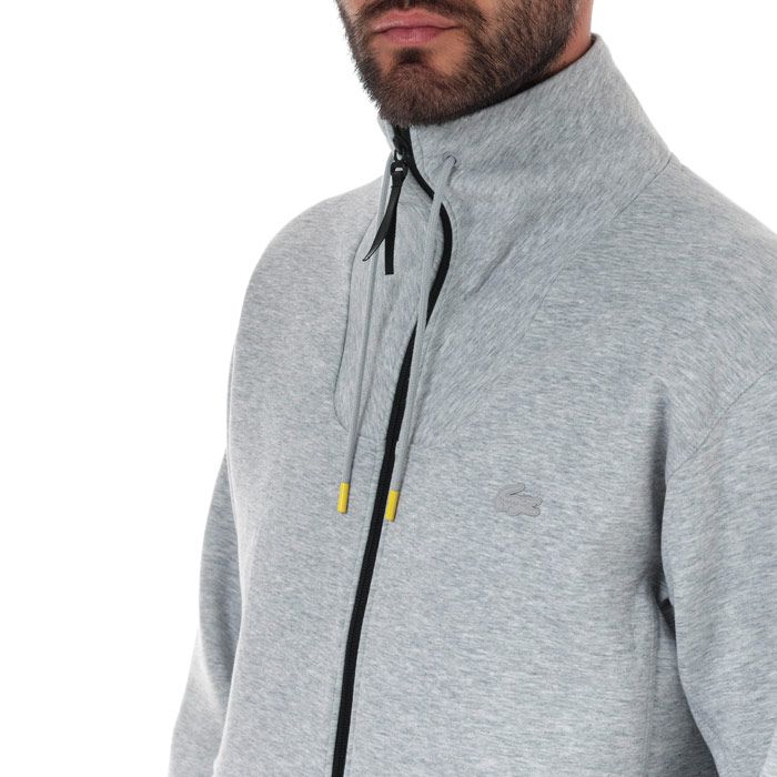 Mens Lacoste Motion Ergonomic Cotton Blend Zip Sweatshirt  Grey.  <BR><BR>- Stretch Milano cotton.<BR>- Contrast elasticised edge three-part hood.<BR>- Contrast zip side pockets.<BR>- Lacoste designer silicone badge at back and elasticised finishes at bottom of garment.<BR>- Silicone crocodile on chest.<BR>- Cotton 78%  Polyester 17%  Elastane 5%. Machine washable.<BR>- Ref: SH860100CCA.