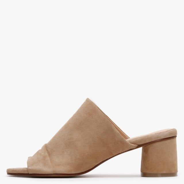 Add the Daniel Silvia Suede Slouchy Mules to your New Season wardrobe. This simple yet chic everyday style is crafted from a premium suede upper with luxurious leather lining. An easy to wear classic slip on style featuring slouchy upper, peep toe and wrapped heel. Signature Daniel branding is seen on the foot-bed.