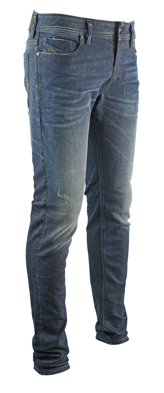 Diesel Sleenker 084JM Jeans. Distressed and Faded. 87% Cotton, 12% Polyester, 1% Elastane. 5 Pockets. Button Fly. Style - Sleenker 84JM