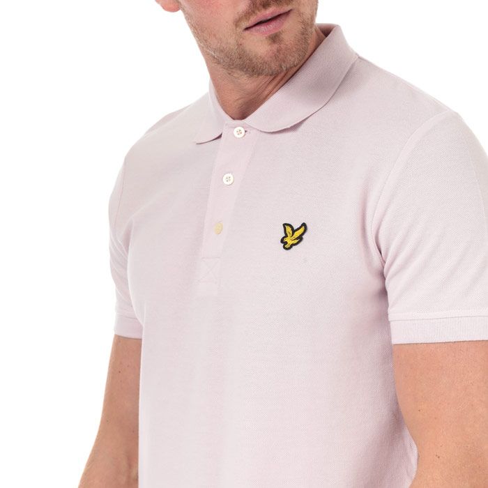 Mens Lyle And Scott Plain Polo Shirt in dusky lilac.<BR><BR>- Ribbed polo collar.<BR>- Three button placket.<BR>- Short sleeves with ribbed cuffs.<BR>- Even vented hem.<BR>- Embroidered eagle logo at left chest.<BR>- Woven herringbone back neck tape.<BR>- Regular fit.<BR>- 100% Cotton piqué.  Machine washable.<BR>- Ref: SP400VBZ460