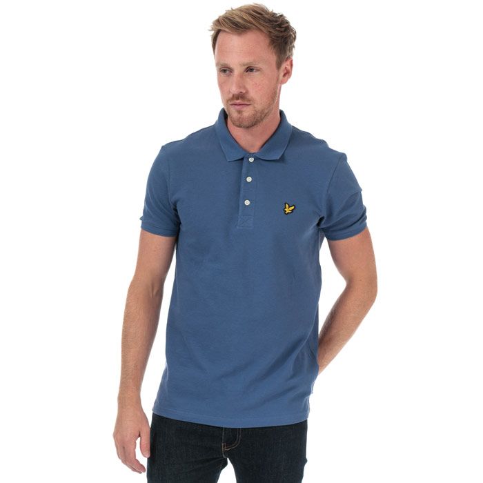 Mens Lyle And Scott Plain Polo Shirt in storm blue.<BR><BR>- Ribbed polo collar.<BR>- Three button placket.<BR>- Short sleeves with ribbed cuffs.<BR>- Even vented hem.<BR>- Embroidered eagle logo at left chest.<BR>- Woven herringbone back neck tape.<BR>- Regular fit.<BR>- 100% Cotton piqué.  Machine washable.<BR>- Ref: SP400VTRA10
