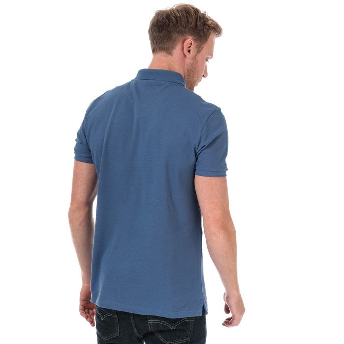 Mens Lyle And Scott Plain Polo Shirt in storm blue.<BR><BR>- Ribbed polo collar.<BR>- Three button placket.<BR>- Short sleeves with ribbed cuffs.<BR>- Even vented hem.<BR>- Embroidered eagle logo at left chest.<BR>- Woven herringbone back neck tape.<BR>- Regular fit.<BR>- 100% Cotton piqué.  Machine washable.<BR>- Ref: SP400VTRA10
