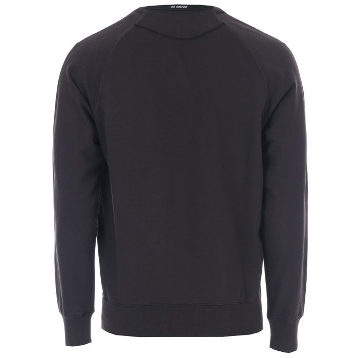 Mens C.P. Company Crew Sweat in Black.<BR><BR>- Crew neck.<BR>- Ribbed collar.<BR>- Long sleeve with ribbed cuff.<BR>- Stretch ribbed waistband.<BR>- CP Company logo to left chest.<BR>- Logo situated on the reverse of the neckline in black and white.<BR>- Shoulder to hem 26in approximately.<BR>- 100% Cotton. Machine Washable.<BR>- Ref: SS048A2246G999<BR><BR>Measurements are intended for guidance only.