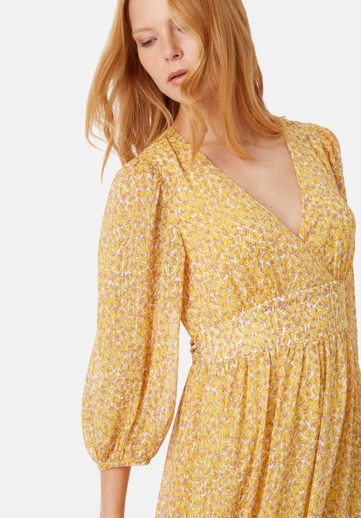 Flattering, feminine and versatile – The Silent Breaths Dress is the ultimate throw-it-on-and-go style. This animal print maxi wrap dress comes complete with volume sleeves, a feminine contrast waistline and distinctive yellow animal print. Style her up or down with chunky boots or your favourite heels. 100% Polyester, Lining 100% Viscose.