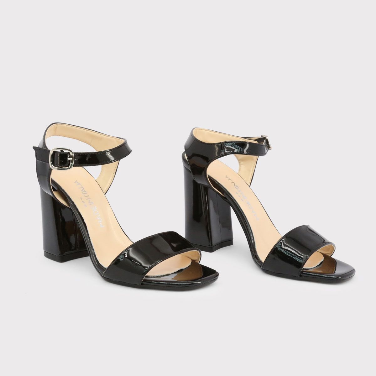 Made in: Italy <br> Collection: Spring/Summer <br> Gender: Woman <br> Type: Sandals <br> Upper: synthetic patent leather <br> Insole: leather <br> Sole: rubber <br> Heel height cm: 10 <br> Details: ankle strap, buckle