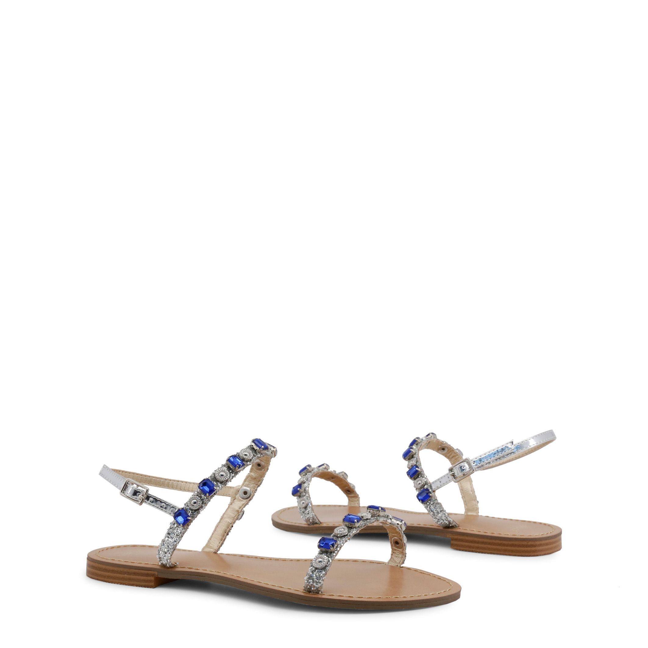 Collection: Spring/Summer <br> Gender: Woman <br> Type: Sandals <br> Upper: synthetic material <br> Internal lining: synthetic material, leather <br> Sole: synthetic material <br> Heel height cm: 1 <br> Details: studs, ankle strap