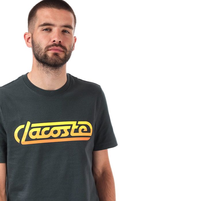Mens Lacoste Live Signature T-Shirt  Grey<BR><BR>- Ribbed crew neck<BR>- Short Sleeves<BR>- Classic fit<BR>- Lacoste neon racing signature<BR>- Classic fit. <BR>- 100% Cotton  Machine washable.<BR>- Ref: TH810000QYA