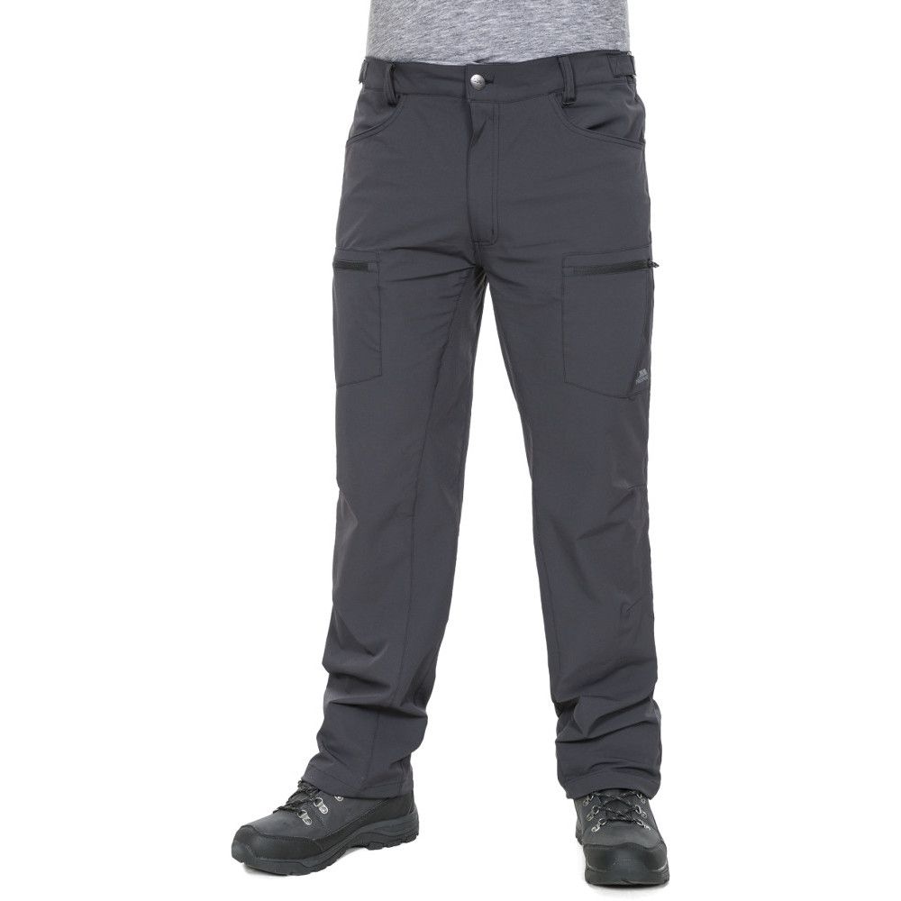 The Tuned men's quick drying stretch active trousers with UV protection use Comfort Stretch fabric and articulated knee darts to maintain the shape and fit of these trousers while you are active and on the move. The flat waist with side adjusters allows you to alter the fit so the trousers remain secure and comfortable. QuickDry fabric technology wicks sweat and moisture away from your body and quickly dries the fabric to help you stay comfortable and fresh all day long. Also featuring built-in UV protection that will protect you from the harmful rays of the sun. The fabric is woven to increase its durability, making them last throughout each season. Available in black with 6 pocket options.