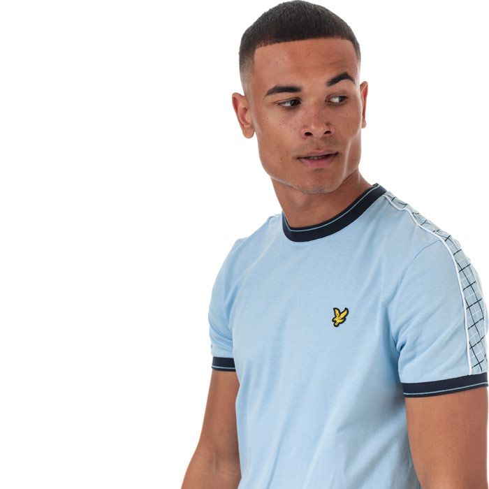 Mens Lyle And Scott Taped Ringer T-Shirt in pool blue.<BR><BR>- Ribbed crew neck.<BR>- Short sleeves.<BR>- Classic ringer styling with contrast ribbing and tipping at neck and cuffs.<BR>- Tartan piqué tape detail at shoulders and sleeves with contrast piping.<BR>- Embroidered eagle logo at left chest.<BR>- Soft and comfortable cotton jersey fabric.<BR>- 100% Cotton. Machine washable.<BR>- Ref: TS1216VZ800