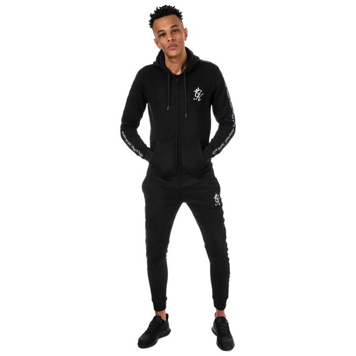 Mens Gym King Tapered Zip Through Tracksuit Top in Black White.<BR><BR>- Adjustable drawcord hood.<BR>- Drawcord with branded aiglets.<BR>- Full zip fastening.<BR>- Long sleeve with ribbed cuffs.<BR>- Tonal taped sleeve detail with Gym King word logo.<BR>- Stretch ribbed waist band.<BR>- Pouch style front pockets.<BR>- GK logo embroidered to chest.<BR>- Shoulder to hem 27in approximately.<BR>- 70% Cotton  30% Polyester. Machine Washable.<BR>- Ref: TST0596<BR><BR>Measurements are intended for guidance only.