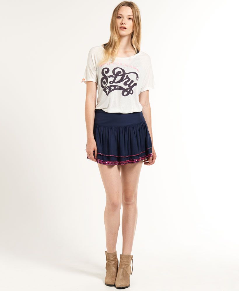 Superdry women's Tiered Embellished skirt. This two-tier short skirt is made from super soft viscose and features exquisite sequin and bead embellishments on the hem, back zip fastening and finished with a metal Superdry logo badge on the upper hem.