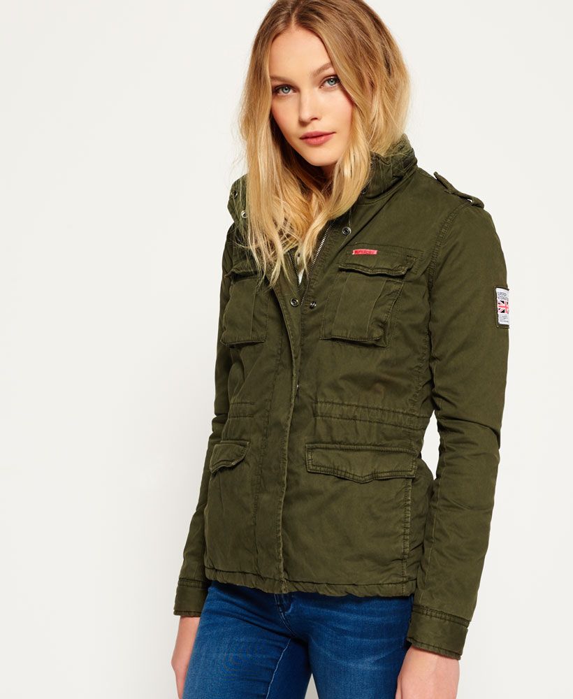 Superdry women’s winter Rookie military jacket. This fleece lined military inspired jacket features a zip and popper fastening, four front pockets, an adjustable waist and a single inner pocket. The Rookie military jacket is finished with Superdry logo patches on the chest and sleeve.Model wears: 
Small Model height: 5’11” (181cm)