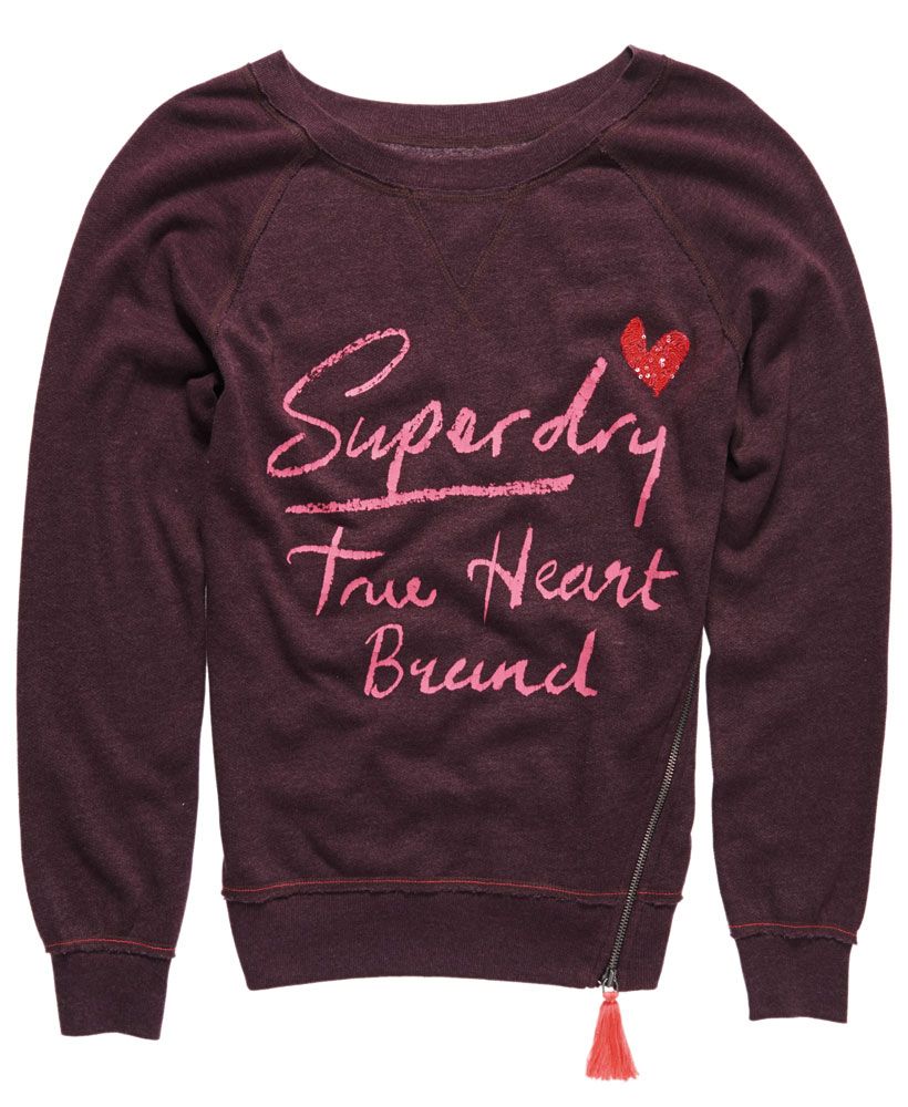 Superdry women's Tassel Crew. A wide crew neck jumper with a hand brushed style Superdry print across the front. The Tassel Crew also features a sequin embellishment and a zip that runs half way up the side with a tassle pull.