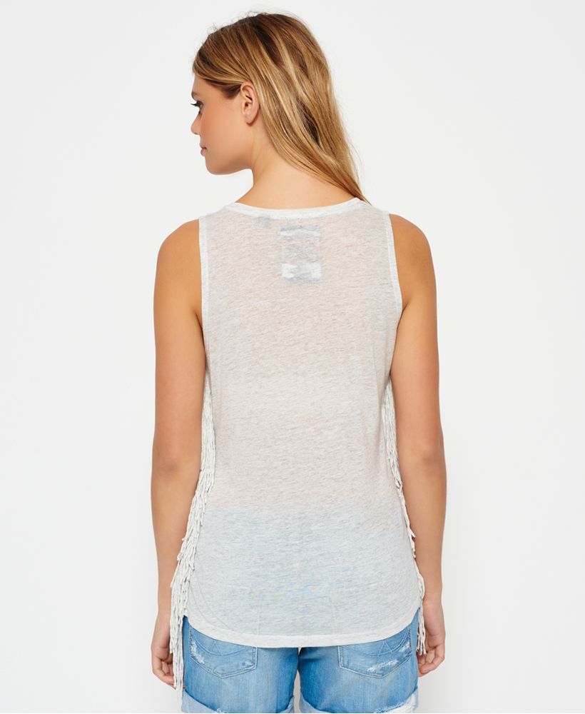Superdry women's side fringe tank top. This sleeveless light weight top features a Superdry logo graphic print on the chest and side seam tassels. The side fringe tank top is finished with a Superdry logo tab above the hem.Model wears: Small Model height: 5’ 11” (180cm)