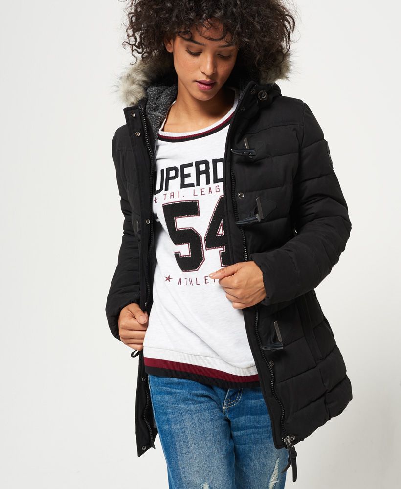Superdry women’s Microfibre tall Toggle Puffle jacket. Stay warm whilst still being stylish in this long, fleece lined jacket that features a zipper and toggle fastening, two front zip fastened pockets and a fleece lined hooded with a faux fur trim. The Microfibre Toggle Puffle jacket is finished with an embroidered Superdry logo on the back and an Original Superdry logo badge on one sleeve.

Model wears: Small Model height: 5’ 9” (175cm) Model chest size: 29