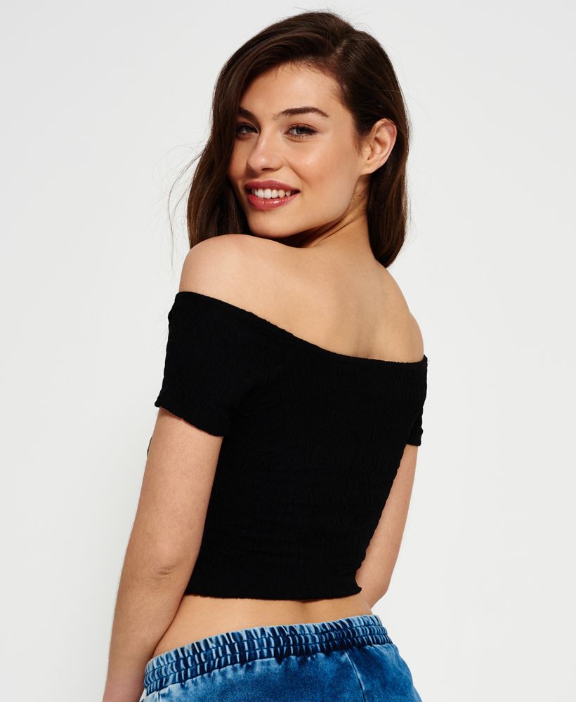 Superdry women’s shirred Bardot top. This cropped Bardot top in a stretchy shirred fabric is a feminine off the shoulder look for your summer wardrobe. Model wears: Small Model height: 5’ 11” (180cm)