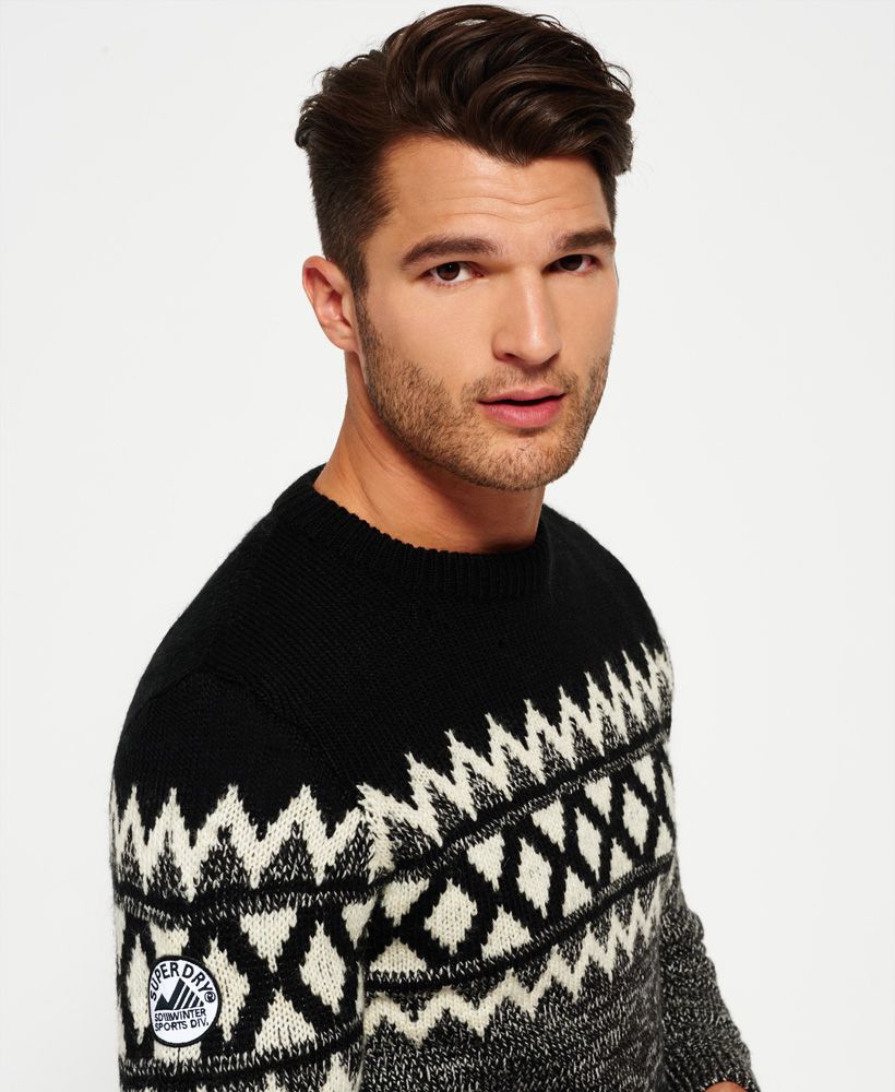Superdry men’s Dolomite Placement crew neck jumper. This jumper, featuring a geometric pattern across the chest, sleeves and back is the perfect addition to any wardrobe. The Dolomite Placement crew is finished with a Superdry Winter Sports logo badge on one sleeve.

Model wears: Medium Model height: 6’ 1” (185cm) Model chest size: 39