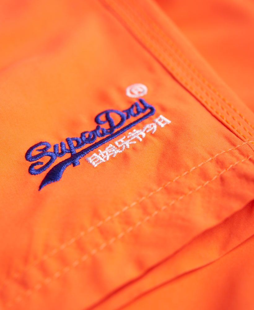 Superdry men's Miami Water Polo shorts. These swim shorts feature a drawstring waist, two front pockets, single zip back pocket and an embroidered Superdry logo above the hem. Inside, the Miami Water Polo shorts have a supportive mesh liner.Please note due to hygiene reasons, we are unable to offer an exchange or refund on swimwear, unless they are sealed in their original packaging.   This does not affect your statutory rights.