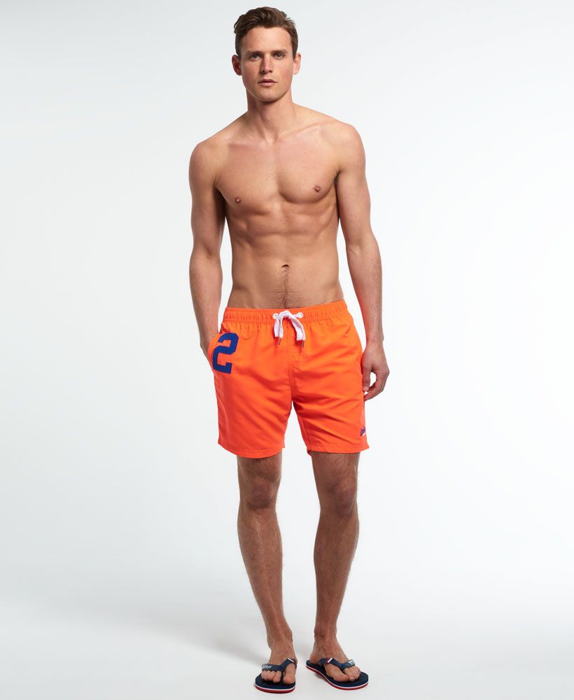 Superdry men's Miami Water Polo shorts. These swim shorts feature a drawstring waist, two front pockets, single zip back pocket and an embroidered Superdry logo above the hem. Inside, the Miami Water Polo shorts have a supportive mesh liner.Please note due to hygiene reasons, we are unable to offer an exchange or refund on swimwear, unless they are sealed in their original packaging.   This does not affect your statutory rights.