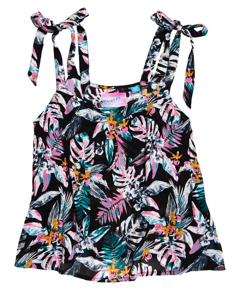 Superdry women’s Alarna cami tie top. Add a pop of colour to your wardrobe with this loose fit cami. The top has tie straps and is finished with a Superdry logo tab on the hem.Model wears: 10/Small Model height: 5’ 8.5” (173cm) Model chest size: 34.5