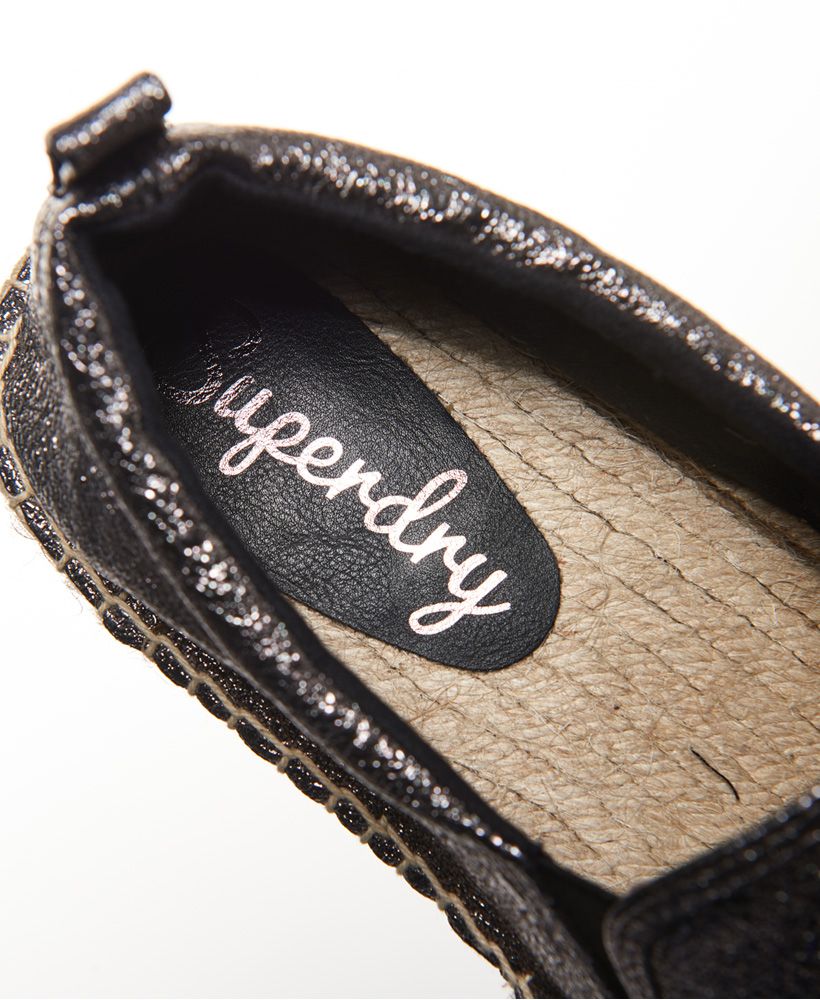Superdry women’s Liora espadrilles. A classically designed espadrille featuring a heel pull tab, toe reinforcement stitching and finished with a small, metal Superdry logo badge on the side of the shoe.