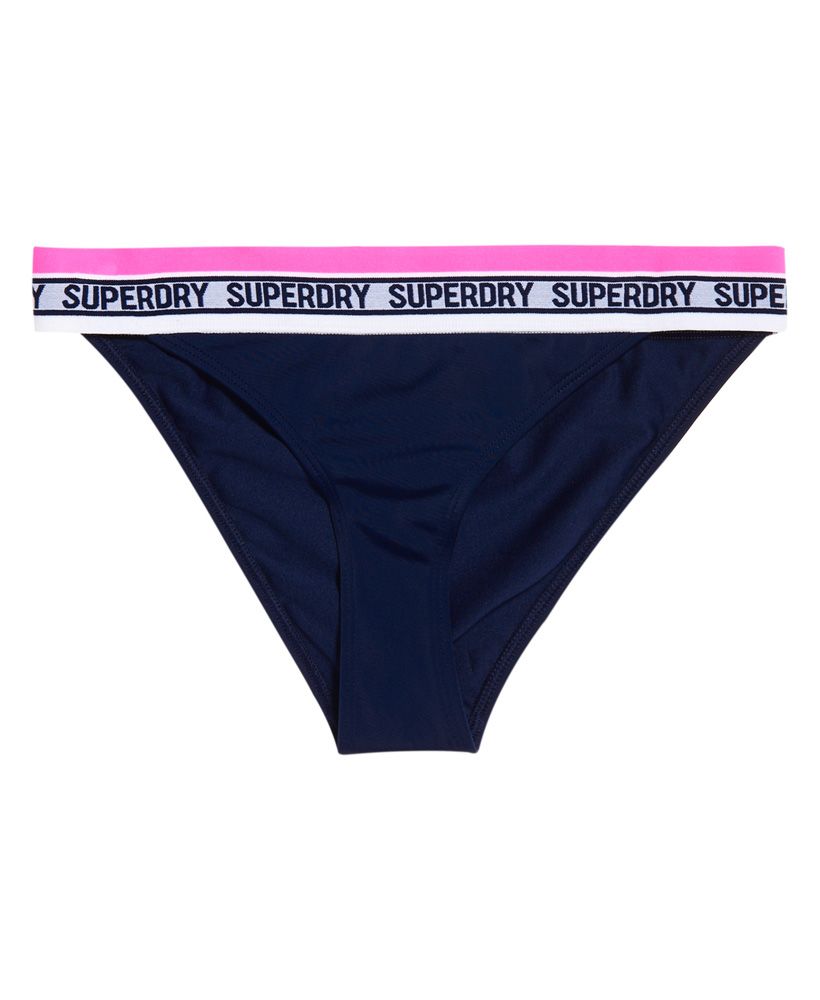 Superdry women’s cross racer bikini bottoms. A classically designed bikini bottom featuring an elasticated waistband with Superdry branding. Please note due to hygiene reasons, we are unable to offer an exchange or refund on swimwear, unless they are sealed in their original packaging. This does not affect your statutory rights.