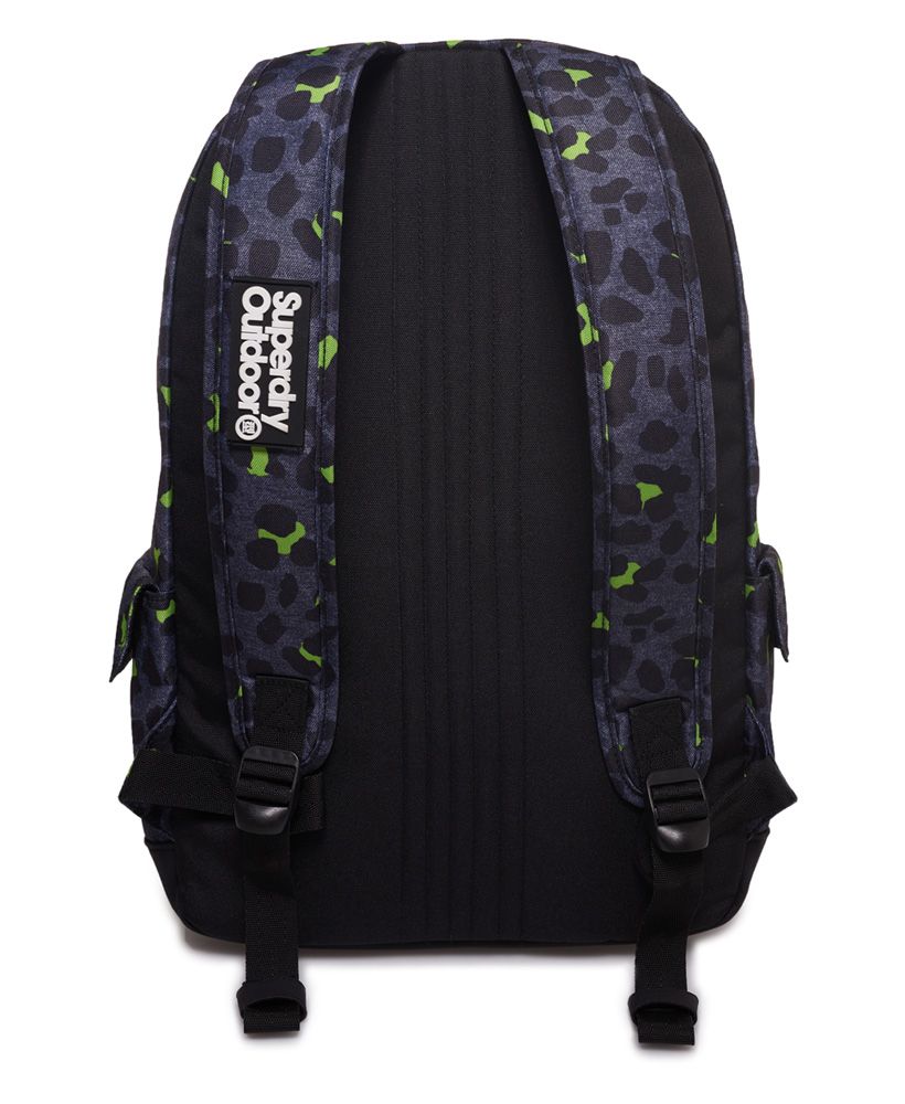 Superdry women's print edition Montana rucksack. A simple, staple rucksack in an all over print fabric. Featuring a top grab handle, padded back and straps and a large main compartment. The print edition Montana also features twin side pockets with popper fastening, a zipped outer compartment and is finished with a silicone Superdry logo patch.21 litre approximate main compartment capacity.H 46cm x W 30.5cm x D 13.5cm