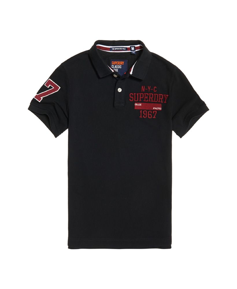 Superdry men’s Classic Superstate short sleeve polo shirt. This classically designed short sleeve polo shirt features an applique Superdry logo on the chest, an applique number logo on the sleeve and split side seams. The Classic Superstate polo shirt is finished with an applique logo badge on the sleeve.