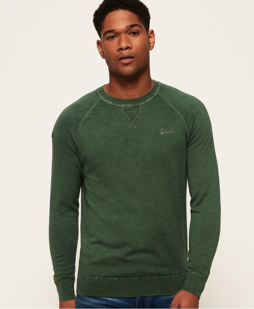 Superdry men’s garment dye L.A crew neck jumper. This jumper is treated with specialist dying techniques that help give it a distressed style that looks unique. The jumper has ribbed cuffs and a ribbed hem as well as a V-Stitch on the neckline. The jumper is finished with a Superdry logo patch on one sleeve and hem and an embroidered Superdry logo on the chest.
