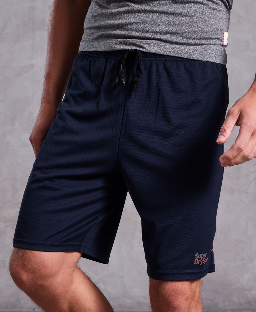 Superdry’s latest Sport Core Collection is a season must-have, combining hi-tech fabrics for professional performance fused with vivid Superdry detailing to create the ultimate work-out look.Superdry men’s Core Train relaxed tricot shorts. These lightweight, relaxed fit shorts feature a drawstring, elasticated waistband and split side seams. The shorts are finished with a Superdry Sport logo above the hem and a signature orange stitch in both side seams.Model wears: MediumModel height: 6’ 2” (188cm)A classic fit. Not too slim, not too tight – no distractions here