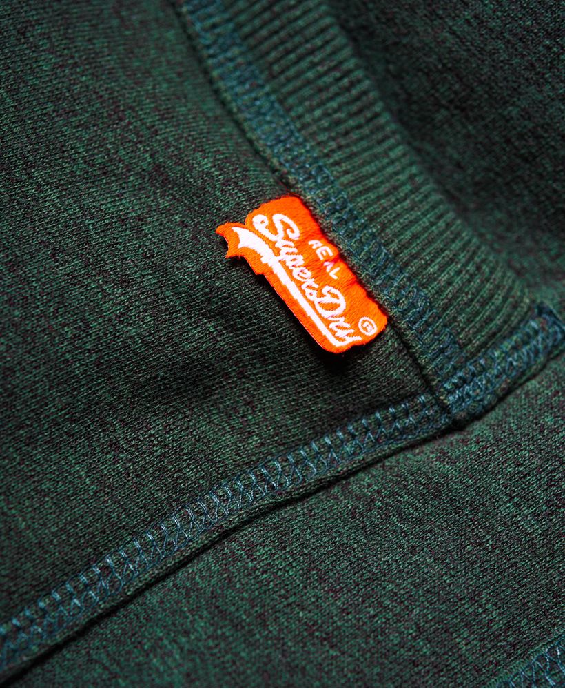Superdry men’s cuffed joggers from the Orange Label range. A staple item to have in any man’s wardrobe, these cuffed joggers have been designed with a drawstring waistband to provide a personalised fit and ultimate comfort. Featuring ribbed panel sides down both legs to enable easy movement, ribbed cuffs for a good fit and the iconic Superdry logo on the leg. These joggers have been finished with two front pockets and one back pocket that includes a Superdry tab.