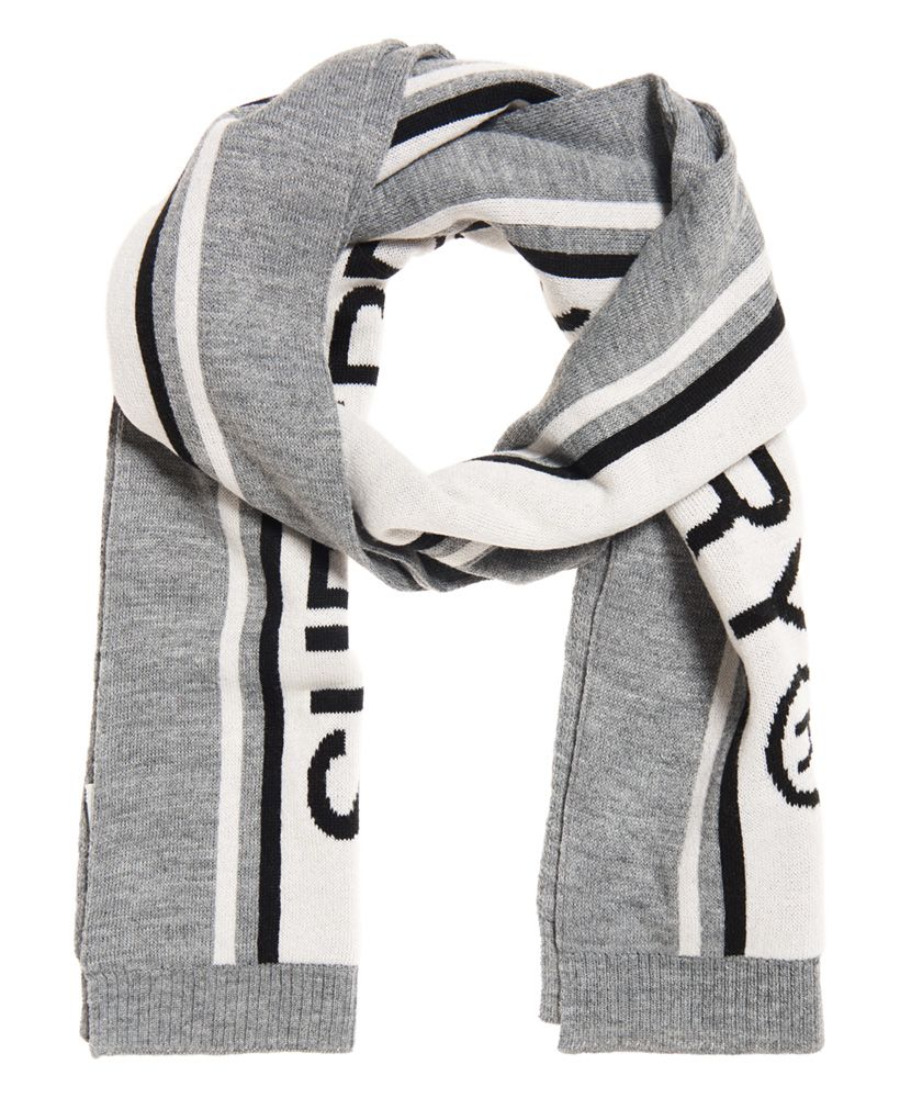 Superdry men’s Oslo racer scarf. Wrap up warm this season with the Oslo racer scarf. The scarf features a stripe design with Superdry logo and will be the perfect finishing touch to any outfit this season.