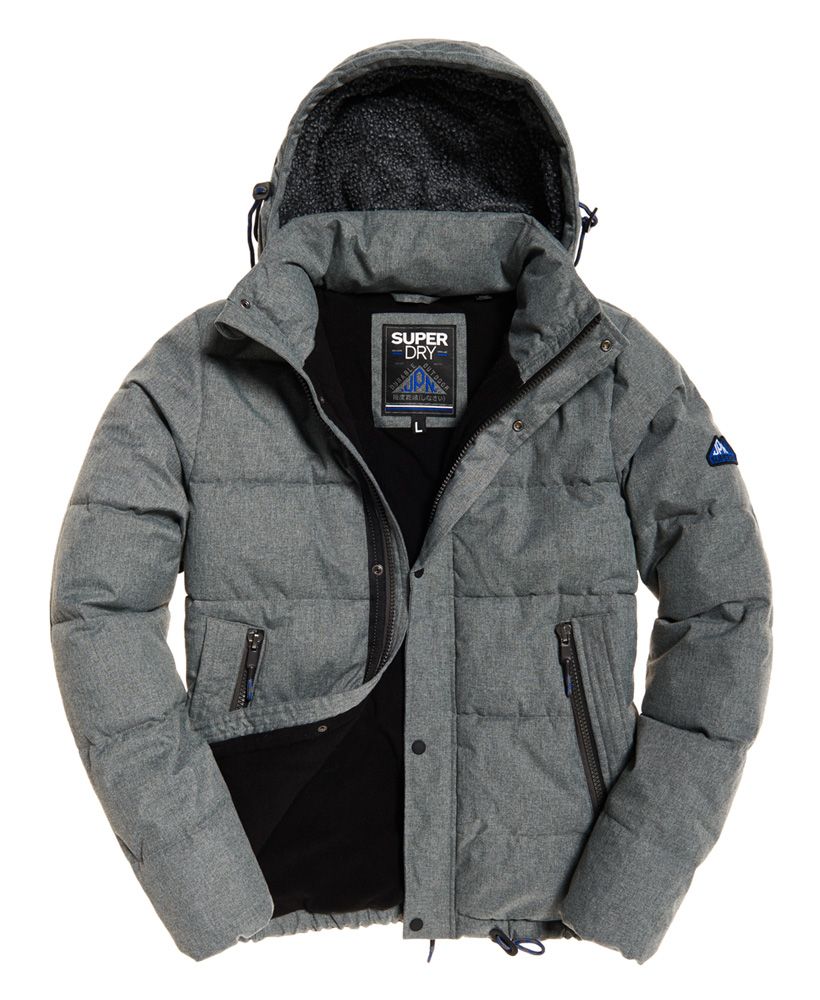 Superdry men’s Academy jacket. Keep warm in this jacket that features a bungee cord adjustable hood with fleece lining, four front pockets and a zip and popper fastening. The Academy jacket also features a full body fleece lining, a toggle adjustable hem and elasticated cuffs. The jacket is finished with an applique Superdry logo badge on the sleeve.