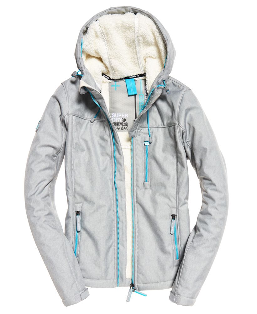 Superdry women’s hooded Winter SD-Windtrekker jacket. Part of the iconic wind family, the hooded SD-Windtrekker is a soft-shell, lightweight jacket designed for practicality and warmth. Featuring a zip fastening, three zipped front pockets and a bungee cord hem and hood. The fleece and mesh lining makes this jacket ideal for layering. For the finishing touches, this jacket features hook and loop adjustable cuffs, a rubber Superdry badge on the arm and an embroidered Superdry logo on the back with contrast stripe detailing.