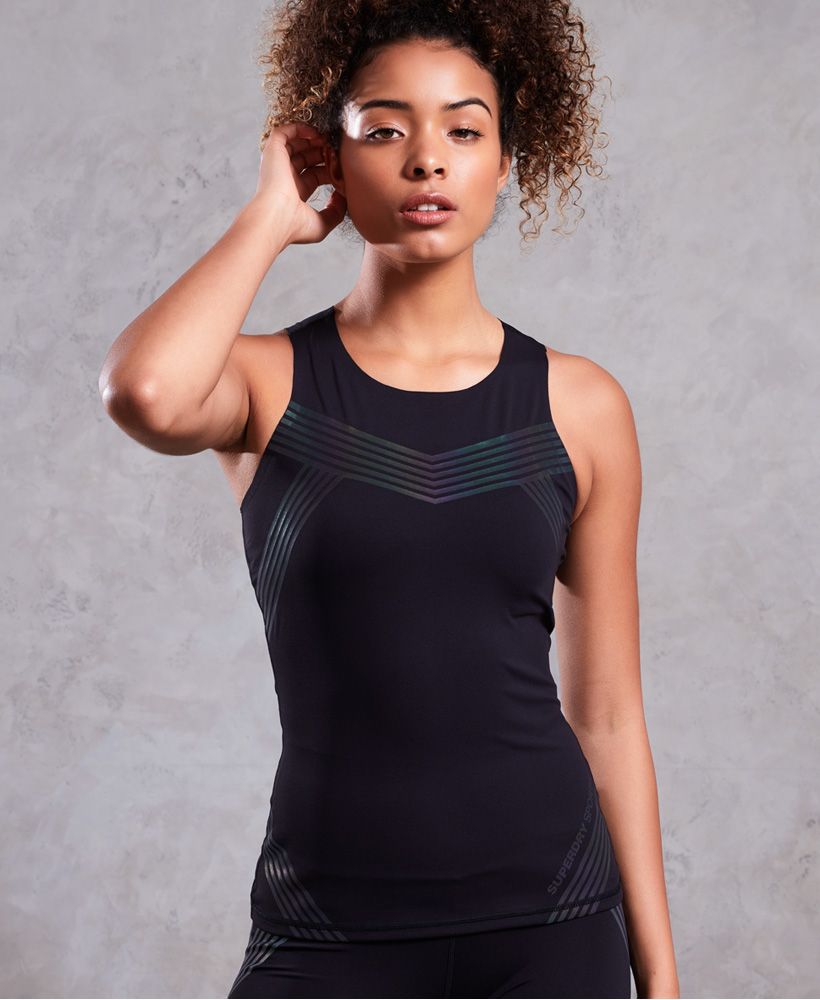 Superdry women’s Performance vest. Combining style with performance, this vest is the addition you need to your workout wardrobe. The Performance vest has been designed with your comfort in mind, featuring flat lock seams and four way stretch compression fabric to help the vest move with you even in the most strenuous of workouts. The moisture wicking fabric helps keep you cool and the finishing touch of subtle reflective logo detailing helps to improve visibility in low light.