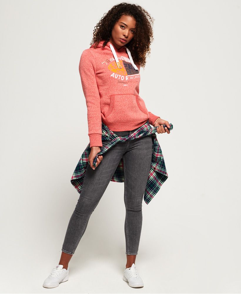 Superdry women’s Gasoline splice hoodie. This overhead hoodie features a drawcord adjustable hood, a spliced, cracked effect Superdry logo design across the chest and a front pouch pocket. The Gasoline splice hoodie is finished with a signature orange stitch in the right side seam and a Superdry logo tab in the left side seam.