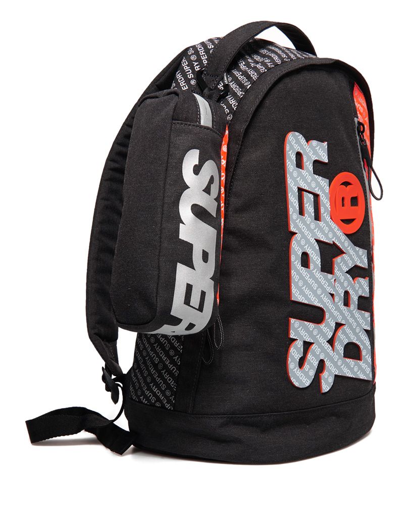 Superdry men's Zac Freshman rucksack. Perfect for any adventure, the Zac Freshman rucksack features a roomy main compartment, complete with laptop sleeve and smaller front compartment, perfect for your smaller essentials. Completed with a high build Superdry logo on the front and padded back and straps for ultimate comfort, the Zac Freshman rucksack also comes with a complimentary pencil case, featuring a zip fastening and Superdry logo detailing.Rucksack: H 41cm x W 35cm x D 11cm 20 litre approximate capacityPencil Case: H 7cm x L 22cm x D 7cm