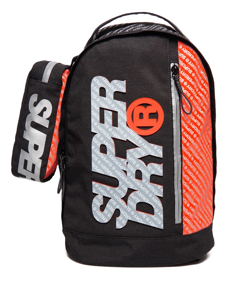 Superdry men's Zac Freshman rucksack. Perfect for any adventure, the Zac Freshman rucksack features a roomy main compartment, complete with laptop sleeve and smaller front compartment, perfect for your smaller essentials. Completed with a high build Superdry logo on the front and padded back and straps for ultimate comfort, the Zac Freshman rucksack also comes with a complimentary pencil case, featuring a zip fastening and Superdry logo detailing.Rucksack: H 41cm x W 35cm x D 11cm 20 litre approximate capacityPencil Case: H 7cm x L 22cm x D 7cm