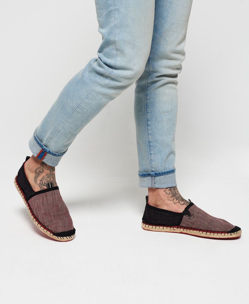 Superdry men's Classic espadrilles. The ultimate casual shoe, these espadrilles feature a pull tab on the heel and front, rope effect detailing on the sole and are completed with logo detailing on the heel. Easy to slip on, style these espadrilles with shorts and a shirt for a relaxed look this season.