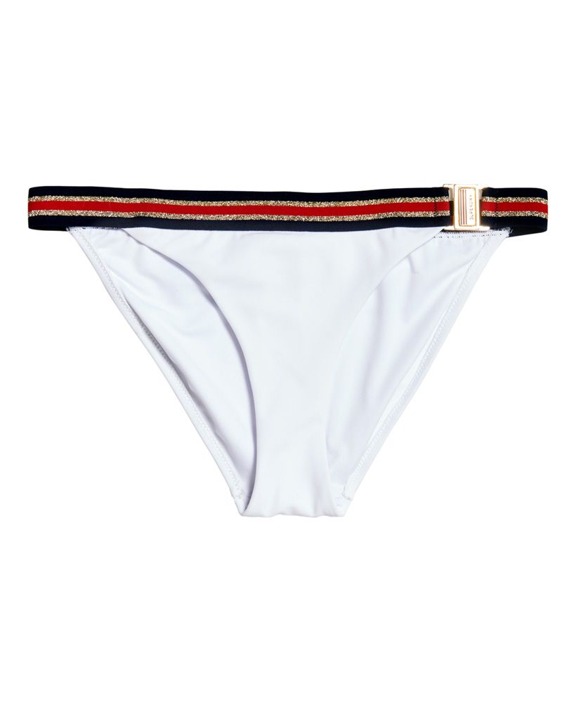Superdry women's Crest logo fixed tri bikini bottom. This bikini bottom features an elasticated waist band with a side clasp fastening. Finished with a Superdry graphic across the back.Matching top available.Please note due to hygiene reasons, we are unable to offer an exchange or refund on swimwear, unless they are sealed in their original packaging. This does not affect your statutory rights.