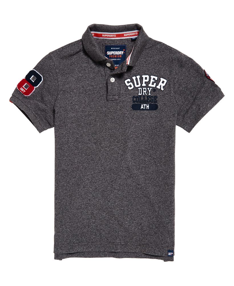 Superdry men’s Classic Superstate pique polo shirt. Made with cotton, this polo shirt features duo button fastening, an embroidered Superdry logo design on the chest and applique logo detailing on both sleeves. This must-have polo shirt is completed with split side seams and a logo tab on the hem. Slim fitMade with Organic Cotton - Made using cotton grown using organic farming methods which minimise water usage and eliminate pesticides, maximising soil health and farmer livelihoods.