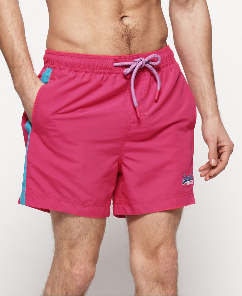 Superdry men's Beach Volley swim shorts. Hit the beach in style this season with the Beach Volley swim shorts, featuring an adjustable drawstring waistband, two front pockets and a zipped back pocket. These shorts also feature a mesh insert and are completed with an embroidered version of the logo on the leg.Please note due to hygiene reasons, we are unable to offer an exchange or refund on swimwear, unless they are sealed in their original packaging. This does not affect your statutory rights.