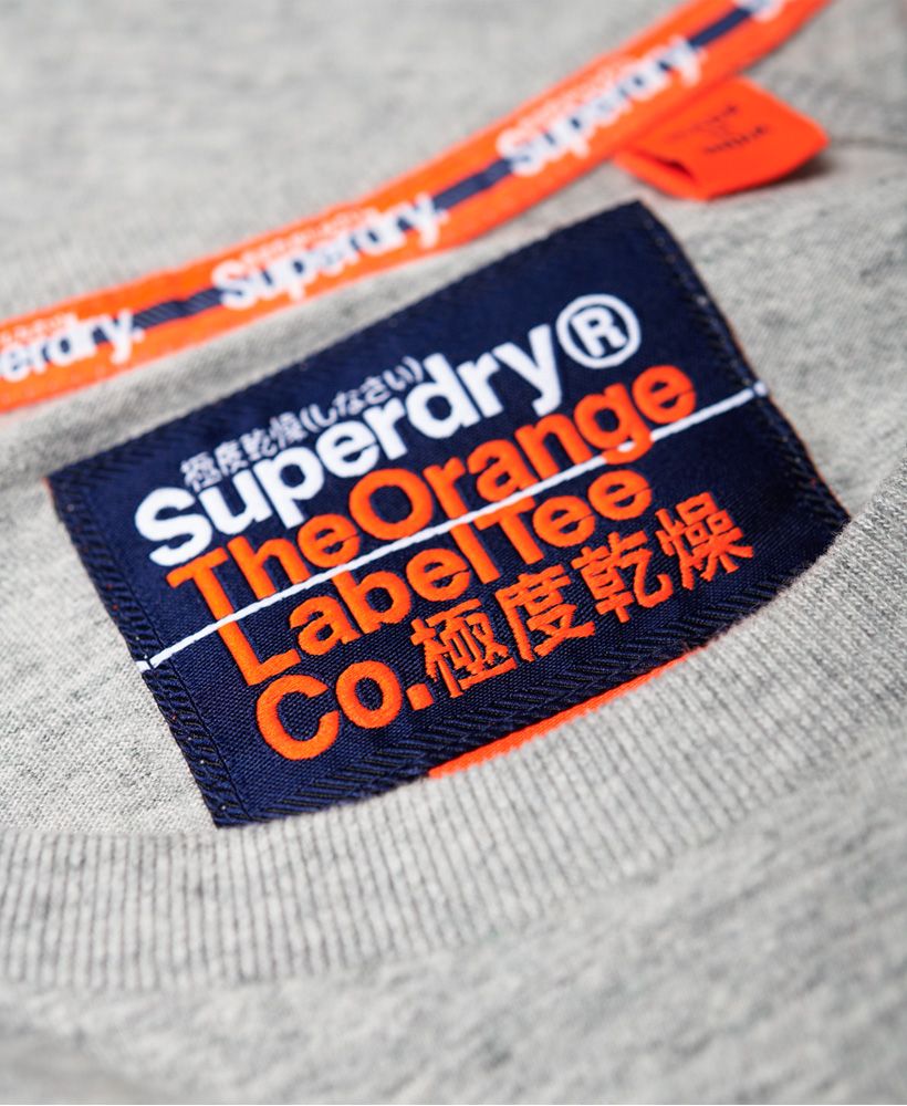 Superdry men's Engineered stripe t-shirt from the Orange Label range. This short sleeved t-shirt features a crew neckline, a striped design on the sleeves and an embroidered Superdry logo on the chest. Finished with a Superdry logo tab on one sleeve.