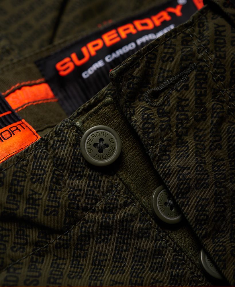 Superdry men's Core cargo lite shorts. Mix up your wardrobe this season with the Core cargo lite shorts. Featuring a six pocket design, button fastening and belt loops, these would look great styled with a t-shirt and trainers for the everyday. The Core cargo lite shorts are completed with branding on the belt loop, a logo patch on the front pocket and small logo badge above the back pocket.