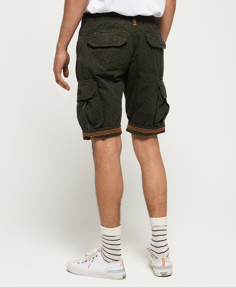 Superdry men's Core cargo lite shorts. Mix up your wardrobe this season with the Core cargo lite shorts. Featuring a six pocket design, button fastening and belt loops, these would look great styled with a t-shirt and trainers for the everyday. The Core cargo lite shorts are completed with branding on the belt loop, a logo patch on the front pocket and small logo badge above the back pocket.