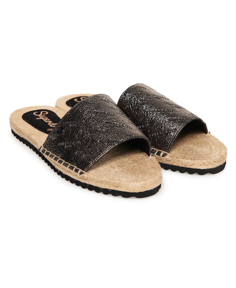 Superdry women's Maya espadrilles. The ultimate slip on summer shoe, these espadrilles feature a wide front strap and logo detailing on the sole. These shoes will be the perfect finishing touch to any summer outfit, from shorts and a t-shirt to a floral dress and denim jacket.